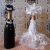 Декор бутылки шампанского на свадьбу