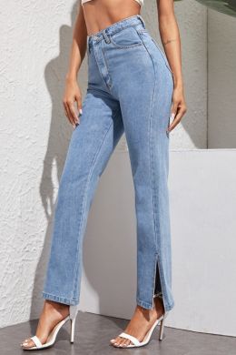 Широкие джинсы с разрезами на коленях