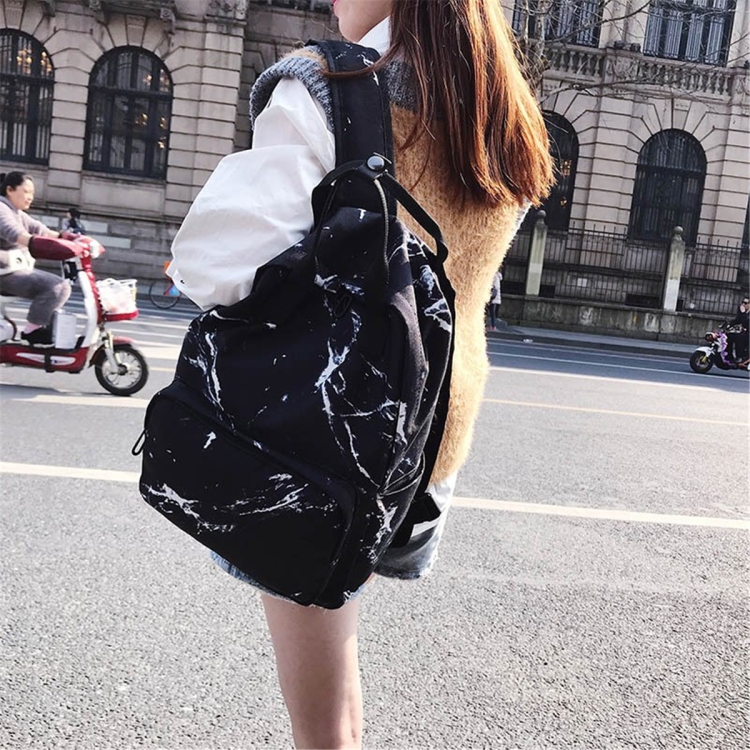 Black Backpack on girl