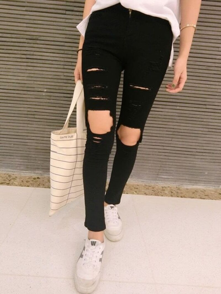 Широкие рваные джинсы женские